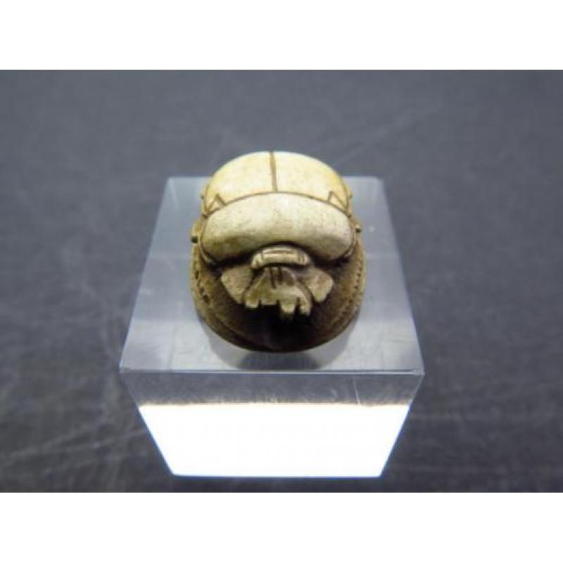 Egyptian steatite scarab with decorations of four Uraeus cob