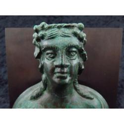 Set of three Roman bronze appliques of a noble women with tw