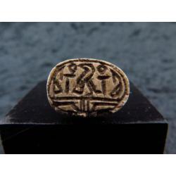 Egyptian steatite scarab with decorations of Horus with the