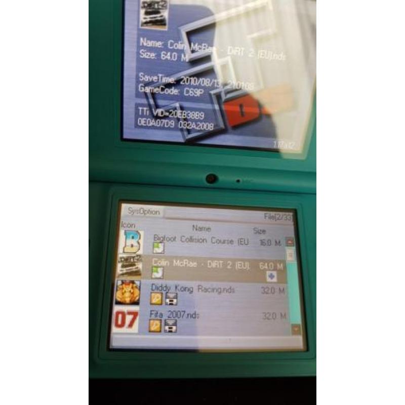 Dsi in doos vol met spellen erop mario pokemon ect