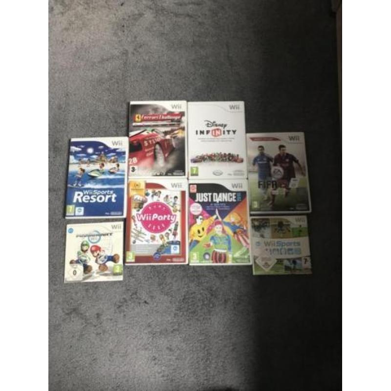 Nintendo Wii + Disney Infinitie + 8 Games