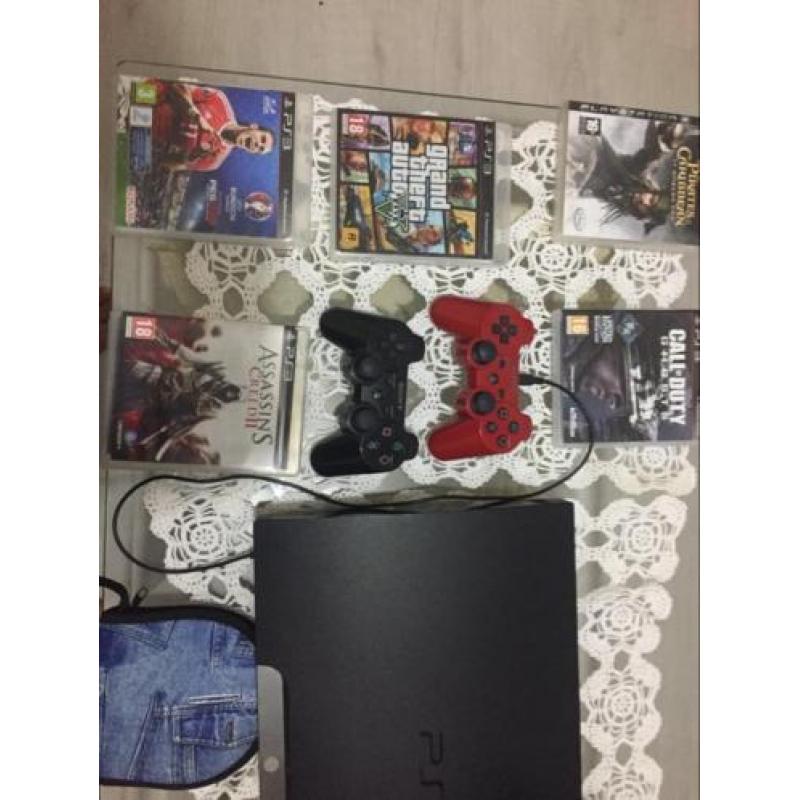 Ps3 met 2controllers en 16games